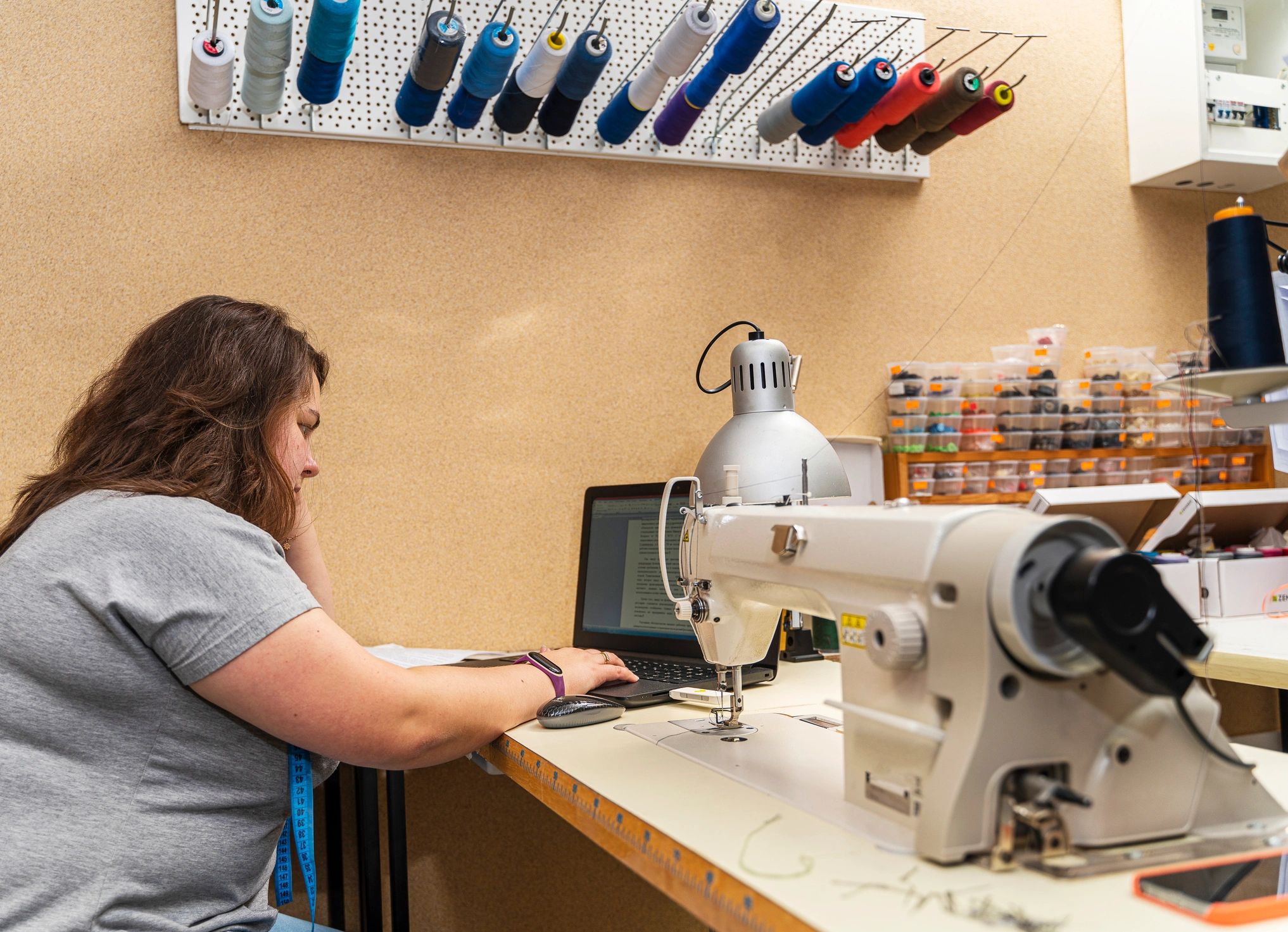 Maker working in a small sewing studio