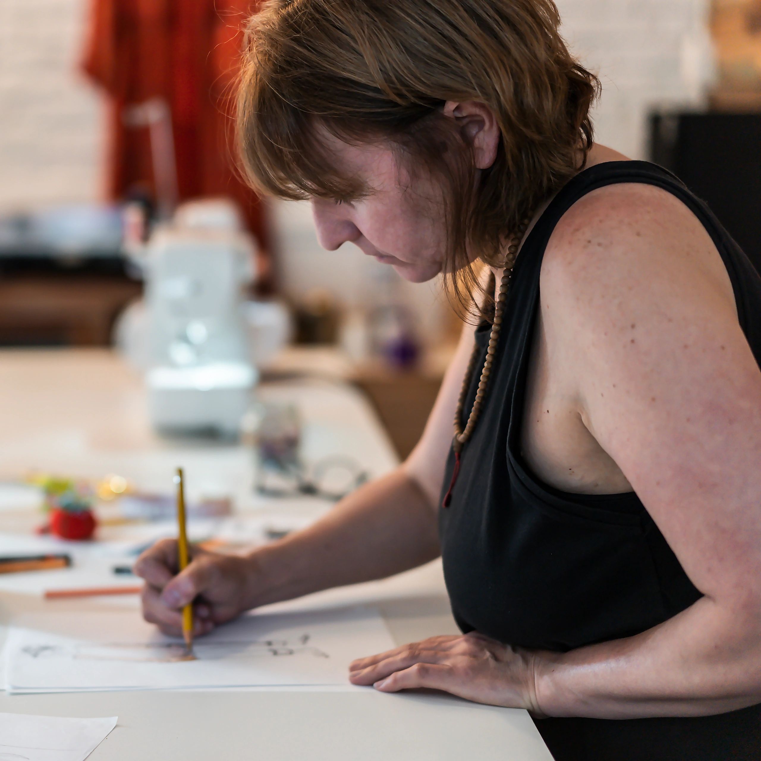 Designer sketching in a studio